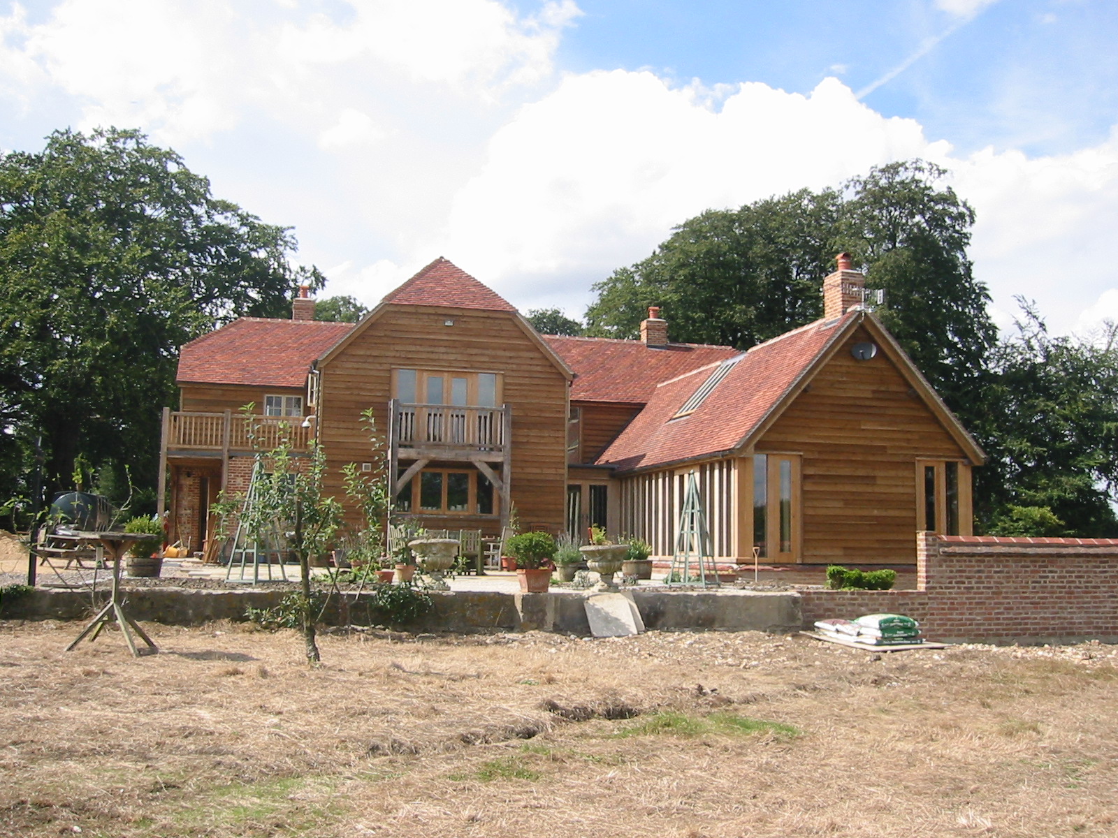 Oak_Framed_&_New_build_Private Manor House_Oak frame trusses_stables_restoration_listed building-House_Tennis court_build_Private Manor House_Exeter College Restoration_listed building _ Imperial-Restoration and Construction-New-Build-Fire Damage-Restoration-Historic-Grade-I-II-Listed Building barn and stable conversion